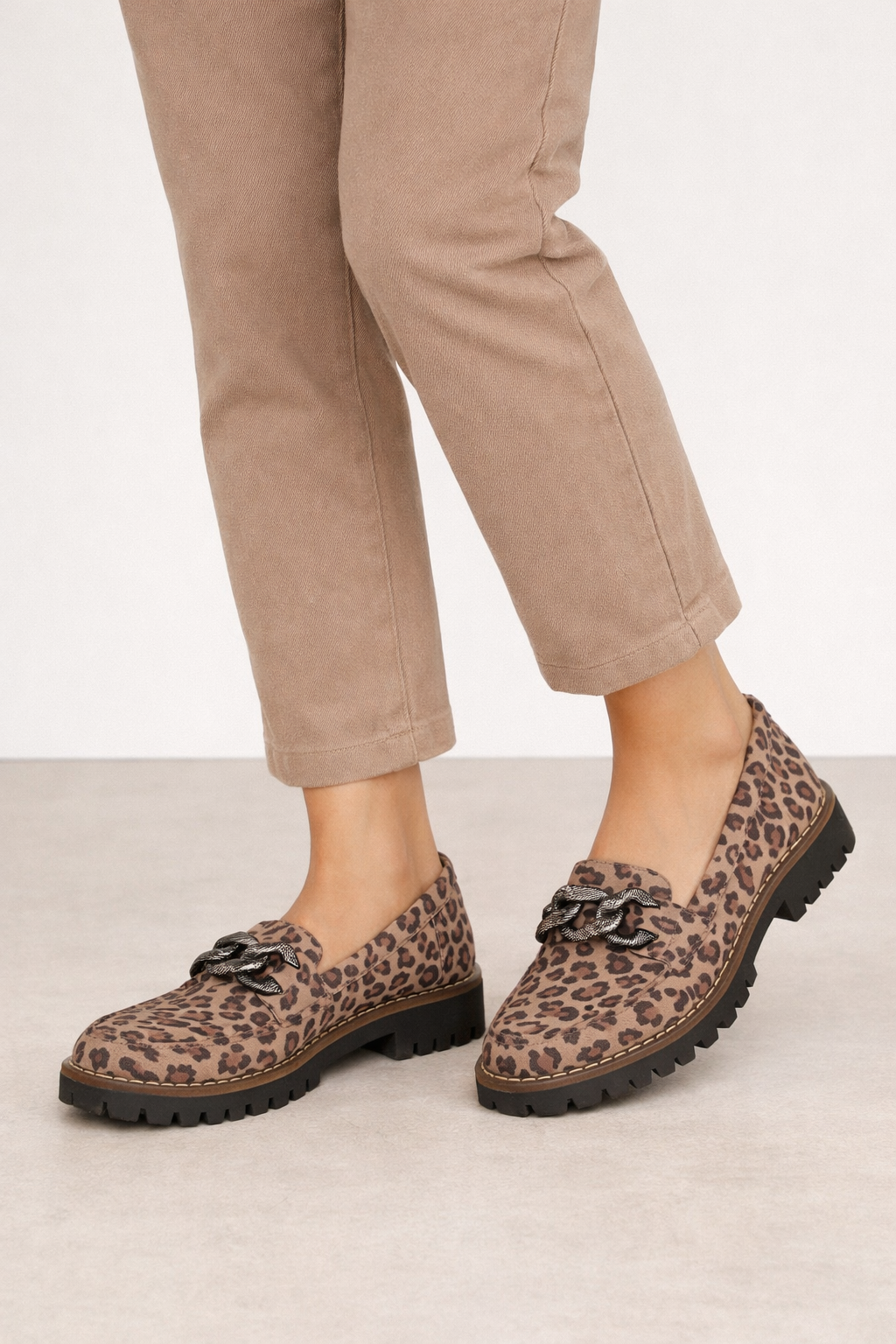 Leopard print chunky loafers with beige pants