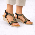 Black and gold embellished wedge sandals worn Cape Verde JO & JOE Collection