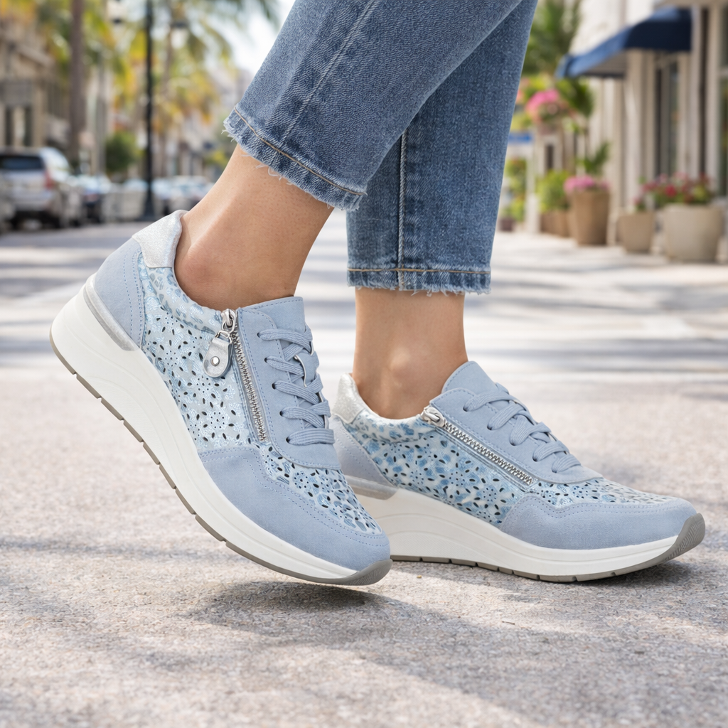 Pair on model Shoreditch ladies blue wedge trainers with lace and side zip Shoes by Emma 